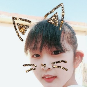 娰郁