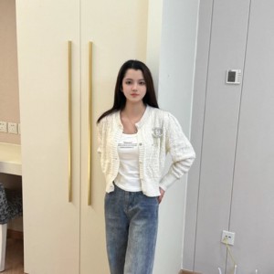 李怡.